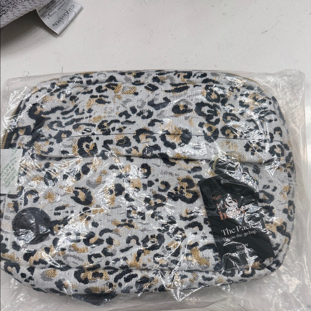 TushBaby The Pack in Snow Leopard Baby Bag - Picture 3 of 4
